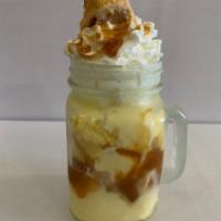 Apple Tart Ice Cream · Vanilla gelato, apple crumble, caramel sauce, and whipped cream. Add rumchata for an additio...