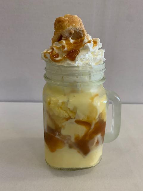 Apple Tart Ice Cream · Vanilla gelato, apple crumble, caramel sauce, and whipped cream. Add rumchata for an additional charge.