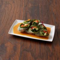 Summer Rolls · Fresh vegetables wrapped with thin rice paper served with tangy peanut sauce.
