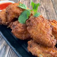 Chicken Wings · Lightly seasoned with Thai spice.