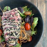 Ahi Tuna Salad · Seared Ahi Tuna over mixed greens with wasabi sesame dressing.