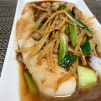 Ginger Fish · Steamed fish filet with fresh ginger, shiitake mushrooms and bok-choy topped with ginger sau...