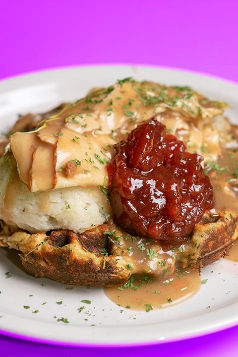 Jive Turkey Waffle · Stuffed waffle topped with smoked turkey, mashed potatoes, cranberry sauce and gravy. Dinners drive-ins dives.