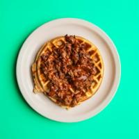 Pulled Pork Waffle · Topped with pulled pork and dinosaur BBQ sauce.