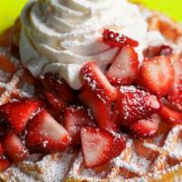 Star Child Waffle · Buttermilk with strawberries and whipped cream.