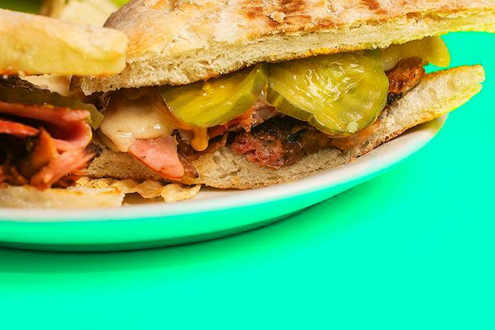 Cuban Sandwich · Pulled pork, sliced ham, pickle, Swiss cheese and mustard.