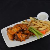 Chicken Wings · Dry rubbed, bourbon BBQ, Buffalo or sweet Thai chili.
