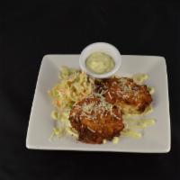 Crab Cakes · With sweet creole mustard and wasabi aioli.