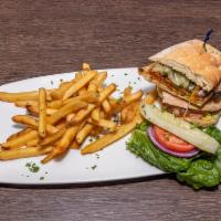 Poblano Chicken Sandwich · Ancho marinated chicken, roasted poblano, onion, lettuce, tomato, pepper jack, aji verde, to...