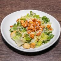 Caesar Salad · Romaine, Parmesan cheese, red onions, garlic croutons, add grilled chicken for an additional...
