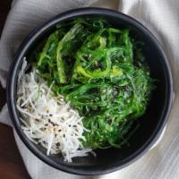 Seaweed Salad · Cooked seaweed and sesame seeds with a rice wine vinaigrette.