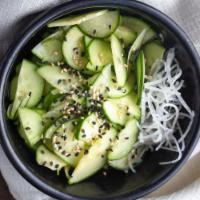Cucumber Salad · Thinly sliced cucumbers marinated with our special vinegar dressing.