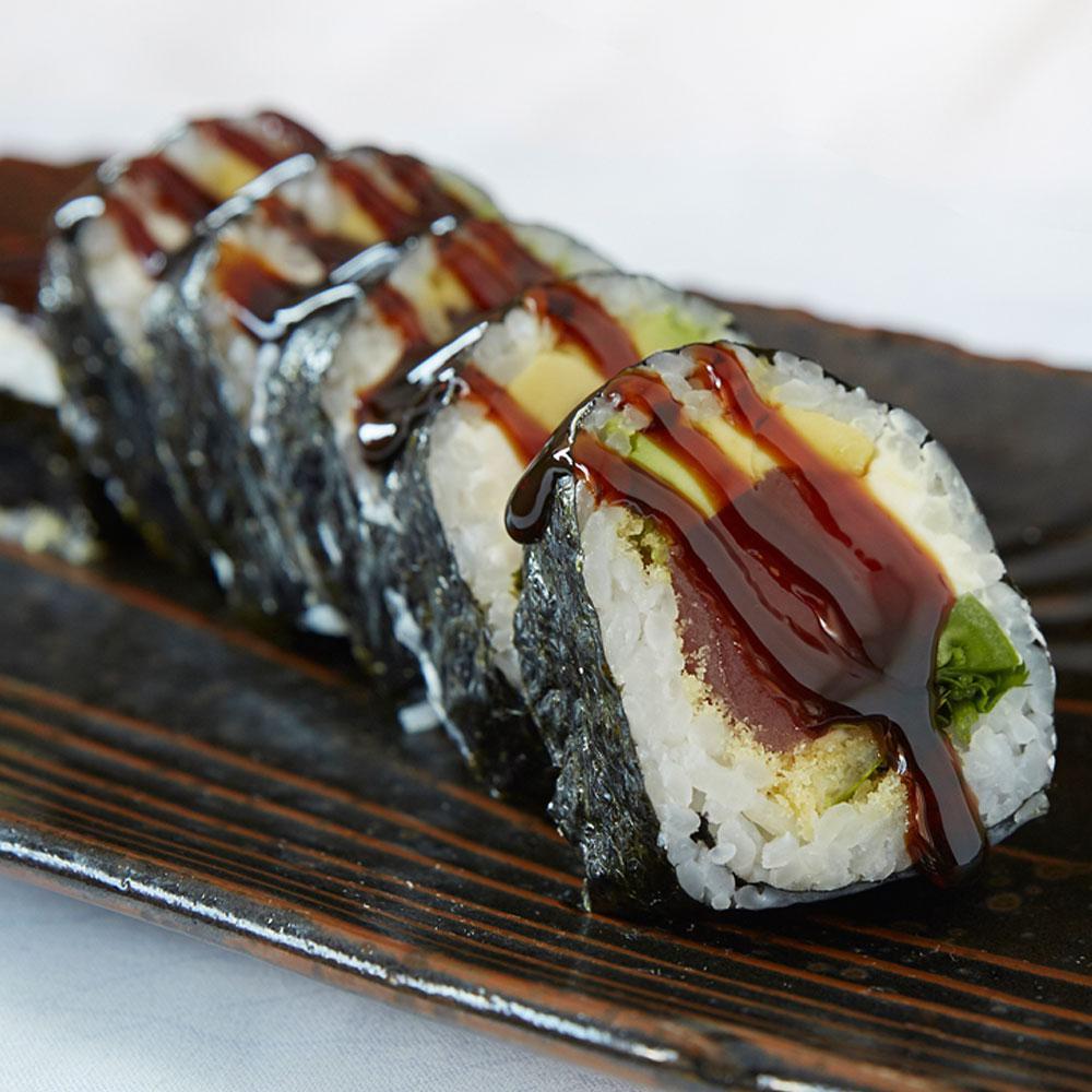 Jezabelle Roll · Tuna, tempura red jalapeno, cilantro, avocado, lime and cream cheese rolled futo maki and topped with sweet sauce.