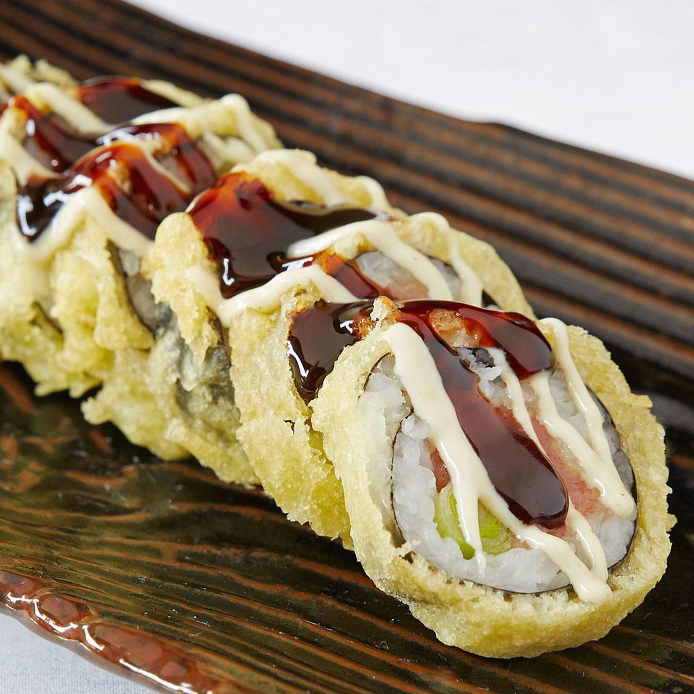 Funky Roll · Tuna, yellowtail or eel and green onions tempura dipped, topped with citrus wasabi and sweet sauce.