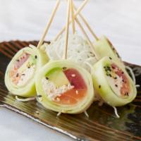 Lollipop Roll · Tuna, salmon, crab salad and avocado wrapped in thinly sliced cucumber with ponzu sauce.