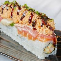 Big Sumo Roll · Tempura shrimp, cucumbers and Sumo sauce topped with 5 types of sashimi, shrimp, avocado, sp...