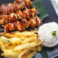 Grilled Chicken Satay · White chicken breast glazed with teriyaki sauce, served with steamed rice and your choice of...