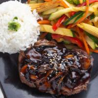 Grilled Tenderloin · 8 oz. certified Angus beef tenderloin topped with mushrooms, onions and teriyaki sauce serve...