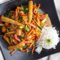 Tofu Peanut Stir Fry · Tofu and seasonal veggies on a bed of steamed rice, served with our spicy Thai peanut sauce....