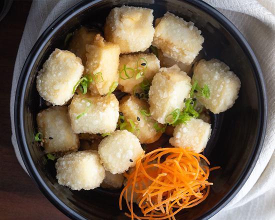 Agedashi Tofu · Flash seared tofu with green onions and bonito flakes served with tempura sauce. Vegetarian.