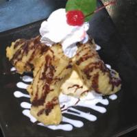 Tempura Banana Split · Tempura dipped banana and crumbled chocolate chip cookies with vanilla ice cream, topped wit...