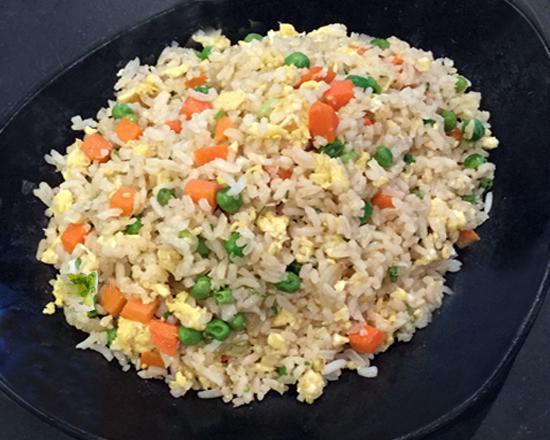 Pan Fried Rice · Wok tossed rice with egg and mixed vegetables