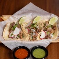 Grilled Chicken Taco · 2 Corn tortillas, your choice of filling, cilantro and onions on top