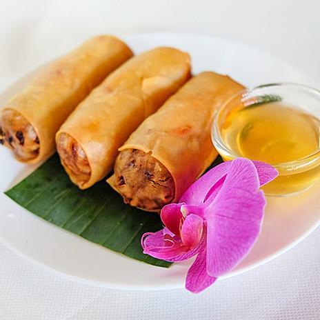 Vegan Spring Rolls · Crispy vegetable spring rolls stuffed with mixed greens, glass noodle, served with plum sauce. 