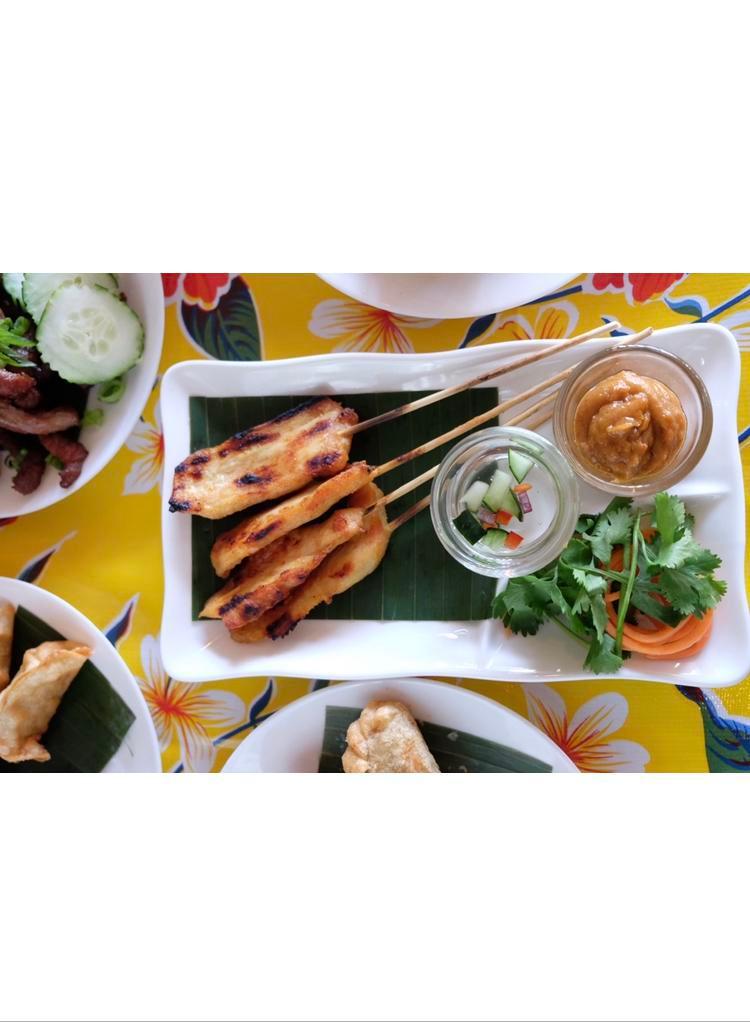 Chicken Satay · Grilled marinated chicken on skewers, served with peanut sauce, cucumber relish, and grilled brioche.