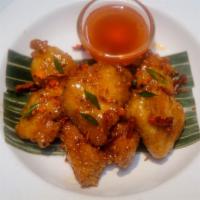 Thai Sweet and Sour Chicken Wings  · Deep fried special marinated wings served with Authentic Thai sweet chili sauce.