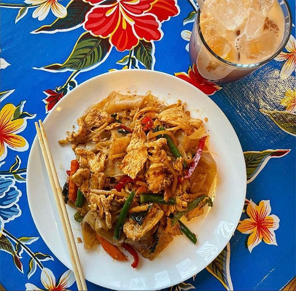 Drunken Noodle · Broad Noodles, Egg, Chili, Onion, Bell peppers, Carrots, Bamboo Shoots, and Basil leaves. Spicy