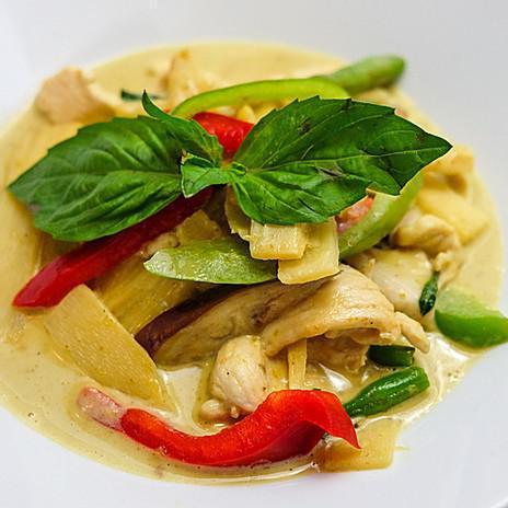 Green Curry  · Authentic Thai Style Green Curry with eggplant, bamboo shoots, string beans, bell peppers & bell leaves with coconut milk. Served with Rice. Spicy. Gluten free.