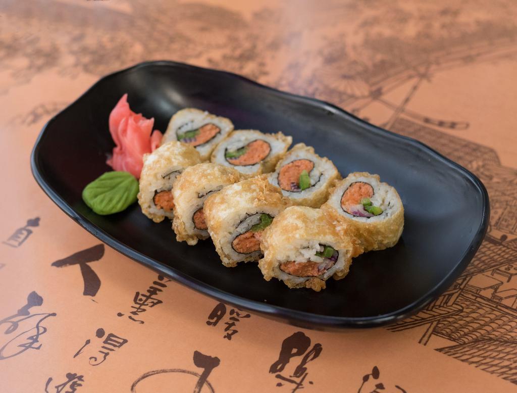 Fire Roll · Spicy tuna, onion, and jalapeno drizzled with spicy mayonnaise and drops of Sriracha.