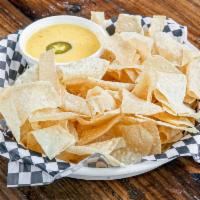 Chips and Queso · House-made chips and dips.