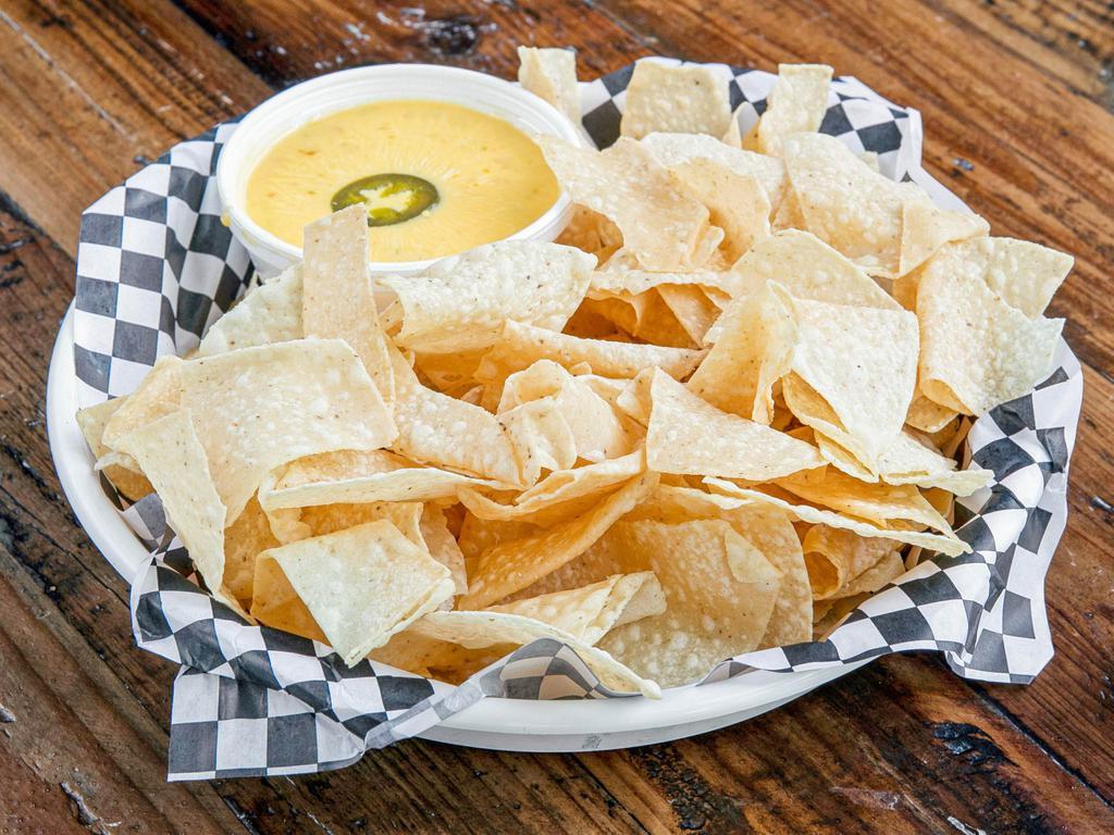 Chips and Queso · House-made chips and dips.