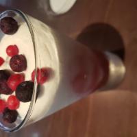 Coppa Yogurt & Berries · Frozen yogurt and Strawberry sauce topped with blueberries 