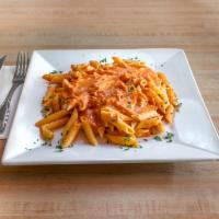 Penne Alla Vodka Sauce · Pink creamy sauce with a touch of vodka.