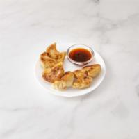 Fried Dumplings · 7 pieces. Stuffed dough and cooked in oil.  