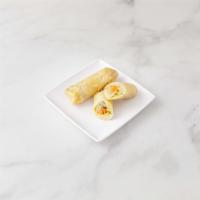 Shanghai Spring Roll · 2 pieces. Rice paper or crispy dough filled with shredded vegetables. 