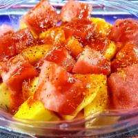 Fruit Bowl  · Melon, pineapple, watermelon,and jicama. Toppings: lemon, sal, chamoy, tajin and valentina. 