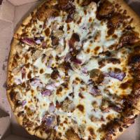 South Western BBQ Pizza · Chicken breast, BBQ sauce, red onions, bacon and mozzarella.