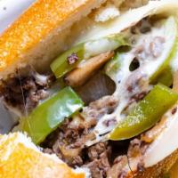5. Philly Cheesesteak Sandwich · Chopped steak, green peppers, onions, mushroom and cheese.