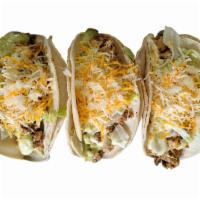 Chicken Tacos · 3 double corn soft tortillas folded and filled with grilled chicken, accompanied with lettuc...