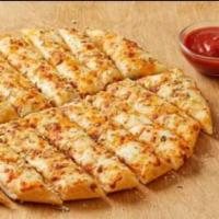 Garlic Cheesebread · Medium. Made on our fresh NYP dough. A light covering of garlic buttery sauce with a heaping...