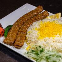 Beef Koobideh (Ground Beef) · Skewers of juicy ground beef charbroiled to perfection over open fire and served with Basmat...