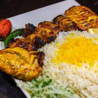 Chicken with Bone (Cornish Hen-YuuuumY)  · Chunks of chicken with bone marinated and charbroiled over open fire and served with Basmati...