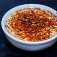 Hummus (Our Own Recipe)  · A dip of smoothly pureed garbanzo beans, sesame tahini, fresh lemon juice, garlic and olive ...