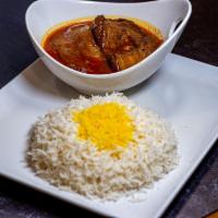 Eggplant Gheymeh Stew · A savory medley of sauteed eggplants, diced beef onions, yellow split peas and dried lime sl...