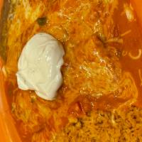 Enchilada Ranchera · 2 pieces of corn tortillas with your choice of chicken, picadillo, ground beef, or cheese, t...
