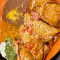 Flautas · Crisp, flour tortillas stuffed with spicy shredded beef or chicken. Topped with tomato, Parm...
